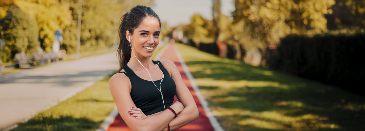 Fitness begeisterte Frau vor der sportlichen Aktivität